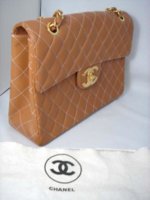 Chanel Tan camel flap side view.jpg