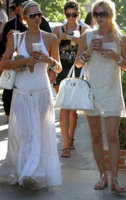 paris & nikki hilton YSL Muses.jpg