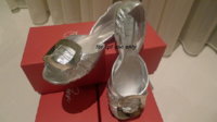 Peep toe silver flats.jpg