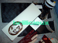 gucci-wristletclutch01.jpg