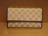 $139 sand gg canvas w brown leather trim continental wallet 001.jpg