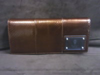 Brown Snake Skin Clutxh $525.jpg