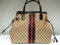 Horsebit with Tassle Large Tote $679.jpg