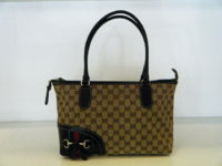 Horsebit with Tassle zip tote $579.jpg