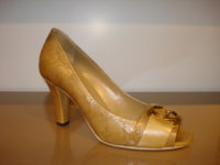 $229 Interlocking light brwn guccissima pump ptoe.jpg