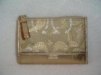 Coach Gold Wristlet.JPG