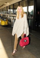 Dakota Fanning with Vernice Satchel.jpg