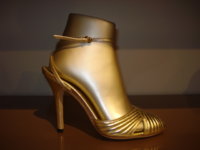 $219 Kelly gold metallic ankestrap.jpg
