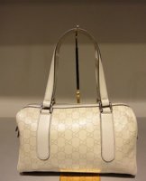 $539 Ivory Medium Guccissima Leather Boston.jpg