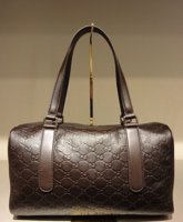 $559 Large Brown Guccissima Boston.jpg