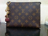 LV - Monogram Toiletry Pouch 19 with Cabochon Key Holder.jpg