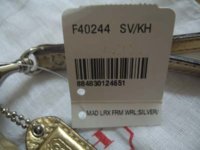 Coach Lurex Frame Wristlet Price Tag.jpg