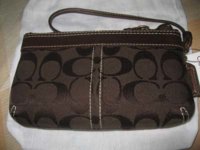 Coach Duffle Wristlet Front.jpg