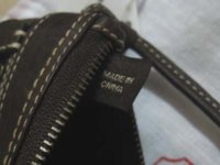 Coach Duffle Wristlet Made in China Tag.jpg