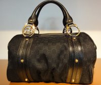 $949 Black GG Canvas Interlocking Boston Bag.jpg