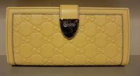 $239 Signoria wallet in Guccissima yellow leather.jpg