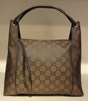 $299 Large Brown Jacquard Hobo With Long Zipper Strap.jpg