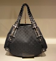$1,019 Pelham Medium Black GG Canvas Hobo.jpg