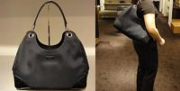 $389 Large Black Hobo With Guccissima Corners.jpg