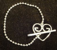 $139 Sterling silver Bracelet w Heart GG Charm.jpg