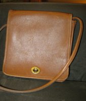 tan cross body coach front.jpg