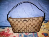 Gucci-small.jpg Gucci-small.jpg