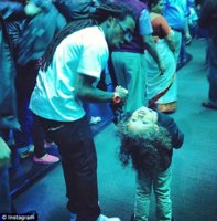 Lil Wayne and son Dwayne at the Atlanta Aquarium (taken days before seizure) Credit dailymail.jpg