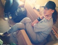 Rihanna Instagram Alexander Wang Joan cut-out ankle strap pumps and Chanel cuff on flight to San.jpg