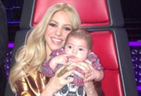 Shakira's baby Milan is bemused by the performances as she carries him to work on The Voice in L.jpg