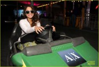 vanessa-hudgens-austin-butler-neon-carnival-bumper-cars-09.jpg
