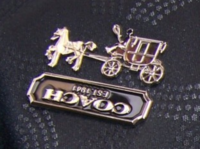 authentic logo plaque upside down 2.png