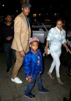Carmelo Anthony, La La Anthony CHANEL, and son Kiyan after winning Game 1 of the playoffs.  Cred.jpg