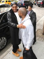 Jay-Z wears Alexander Wang Double Breasted Coat with Leather Sleeves out in NYC as he greets Kan.jpg