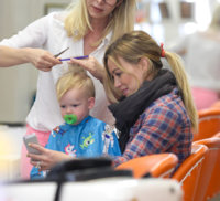 Hilary+Duff+holds+well+behaved+son+Luca+haircut+XT5SWKhNbofx.jpg