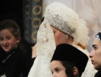 Hasidic bride, Hannah Batya Penet, marries in front of over 25,000 to the future leader of the J.jpg