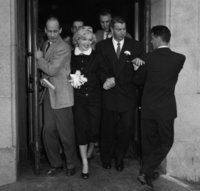 Marilyn Monroe 2 married Joe DiMaggio at San Francisco City Hall in 1954.  She wore a brown wool.jpg