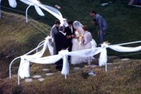 Madonna and Sean Penn married in Malibu, CA in 1985 wearing a gown created by her Like a Virgin .jpg