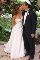 Adam Sandler married Jackie Titone in 2003 at Dick Clark's Malibu estate.  She wore a Carolina H.jpg