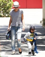 Sandra Bullock with Louis in a Batman costume as she picked him up from school on May 30 Credit .jpg