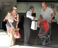 Kelsey Grammer with his wife Kayte and 10-month-old daughter Faith, at a Los Angeles shopping ma.jpg