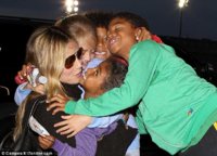 Heidi Klum's kids gathered for a group hug as they saw their mother off at LAX on June 7 Credit .jpg