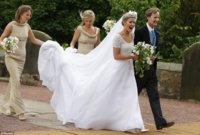 Lady Melissa is accompanied by her father the Duke of Northumberland and two bridesmaids - inclu.jpg
