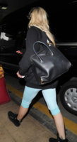 Rita+Ora+seen+leaving+Heathrow+Airport+black+a6Mbt1JCMmcl.jpg