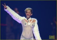miley-cyrus-sings-wrecking-ball-in-nearly-nude-outfit-video-30.jpg