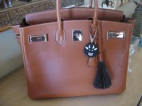 cow and barenia charm on Bisquit 001 (Medium).jpg
