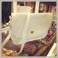consignment shop cream messenger.jpg