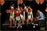 miley-cyrus-stolen-christmas-sweater-at-tampa-jingle-ball-13.jpg