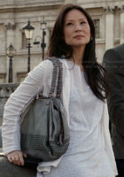 joan-watsons-grey-studded-bag.jpg