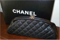 blk caviar clutch.jpg