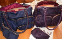 MZ Wallace Kate in Navy and Jane view from front with linings exposed.jpg